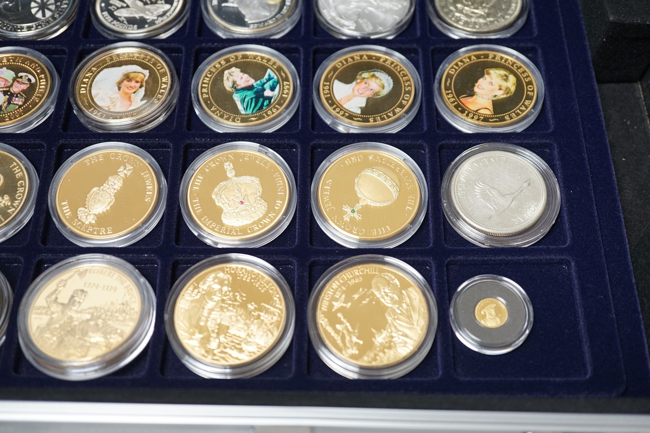 A group of assorted collectors coins, mostly in capsules and a group of loose (often unrelated) certificates